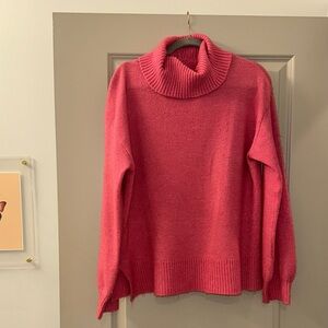 pink turtleneck